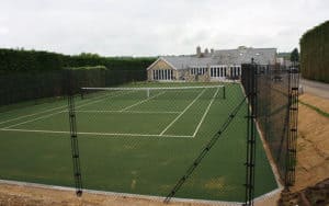 Mitred corner of a tennis court saves space